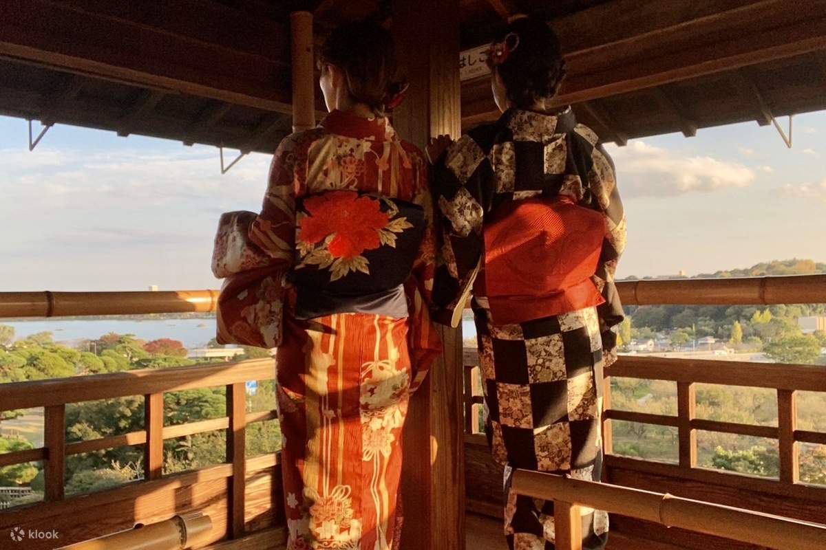 Girls in kimonos gazing at the scenery